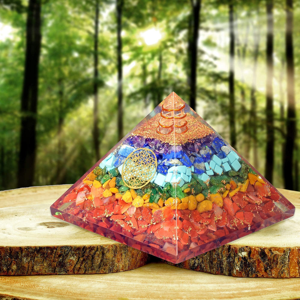 Orgonite Crystal Seven Chakra Pyramid in home setting suggests protective ambiance