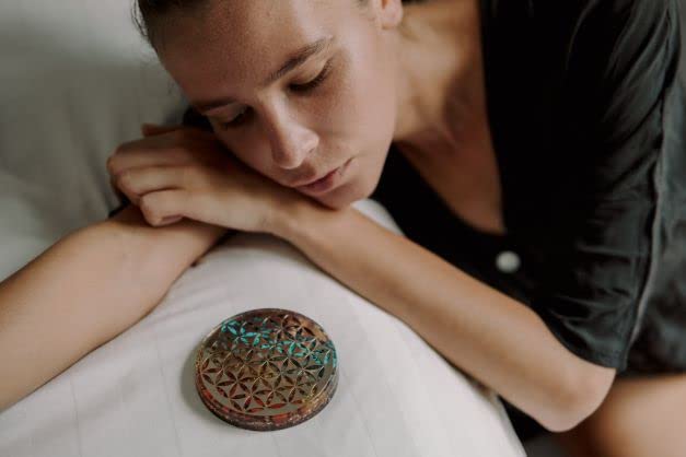 Orgonite Crystal Water Charging Plate for meditation or Reiki spaces.