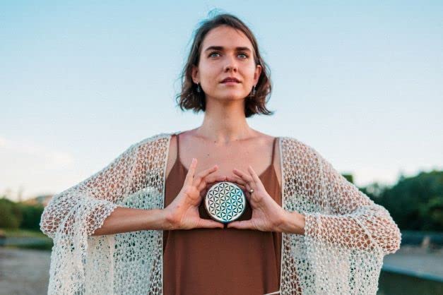 Orgonite Crystal Water Charging Plate sage-cleansing cleanses space energetically.