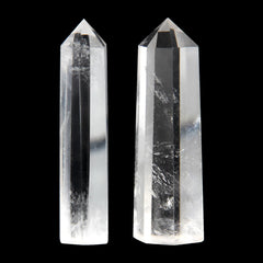 Orientrea clear quartz wand close-up tip, polished facets for tactile relaxation.
