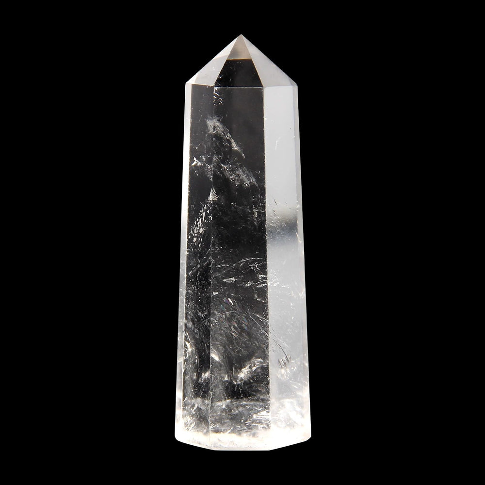 Close-up of Orientrea clear quartz wand polished tip for relaxation.