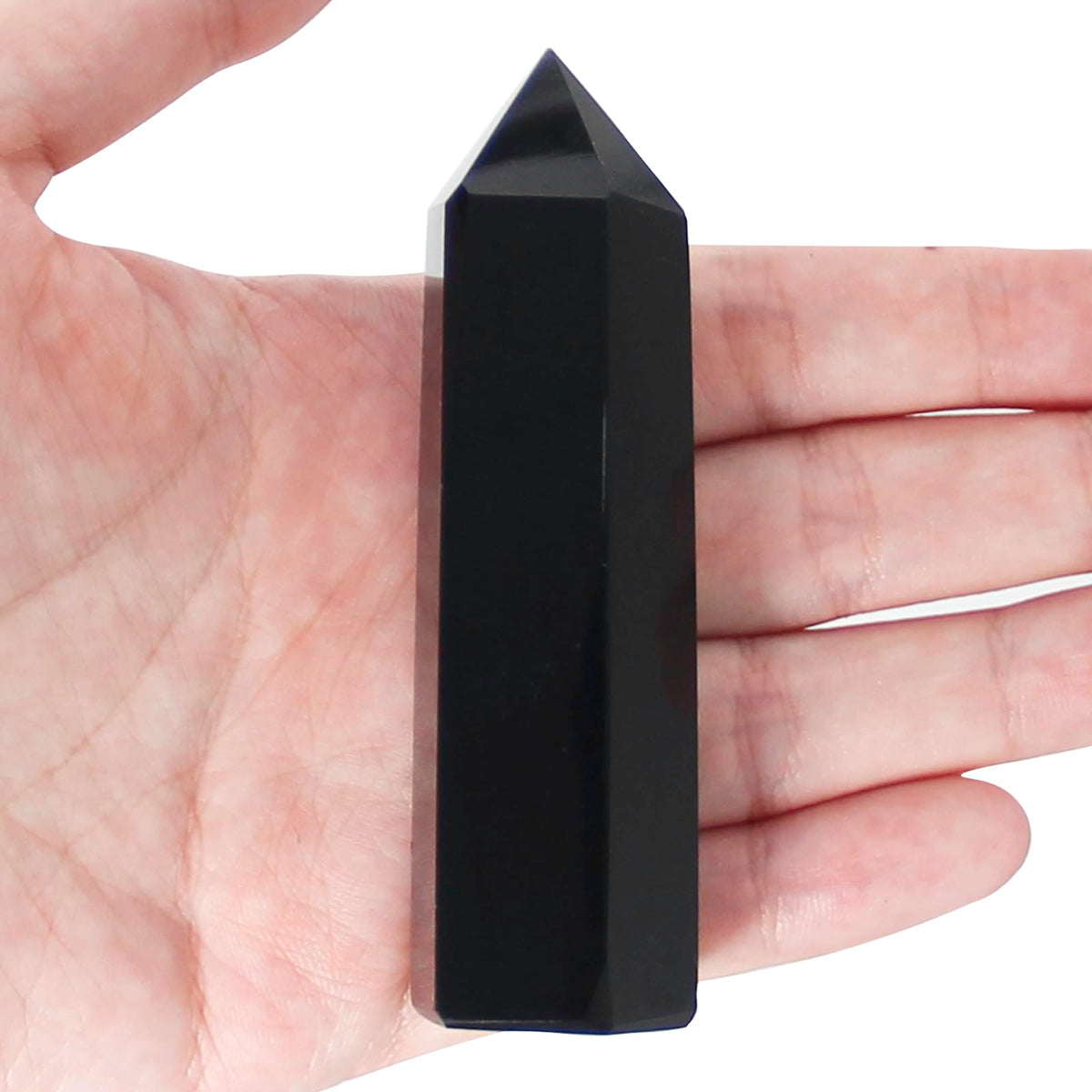 Orientrea Obsidian Wand closeup showing natural polish for meditation focus.