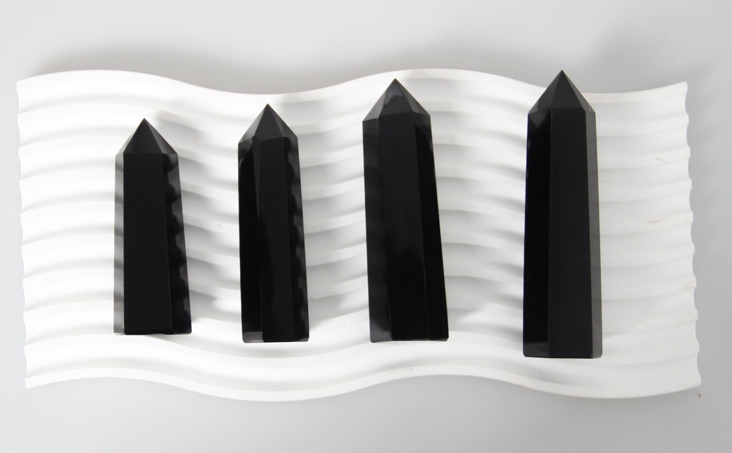 Orientrea Obsidian Wand with smooth surface for relaxing touch during use.