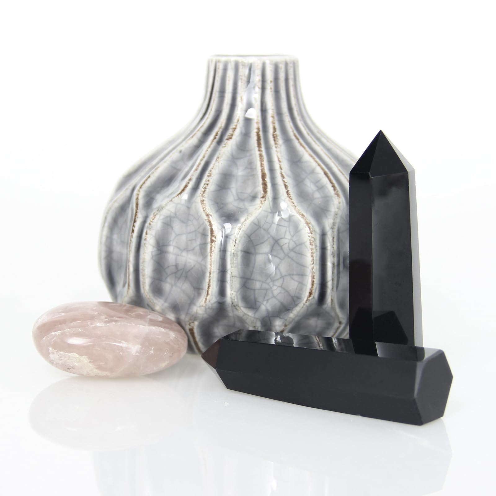 Orientrea Obsidian Wand six-facet design emphasizes balance and grounding rituals