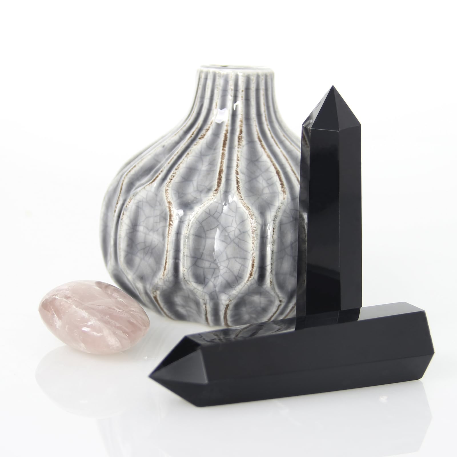 Orientrea Obsidian Wand tip close-up highlighting facets for rituals.
