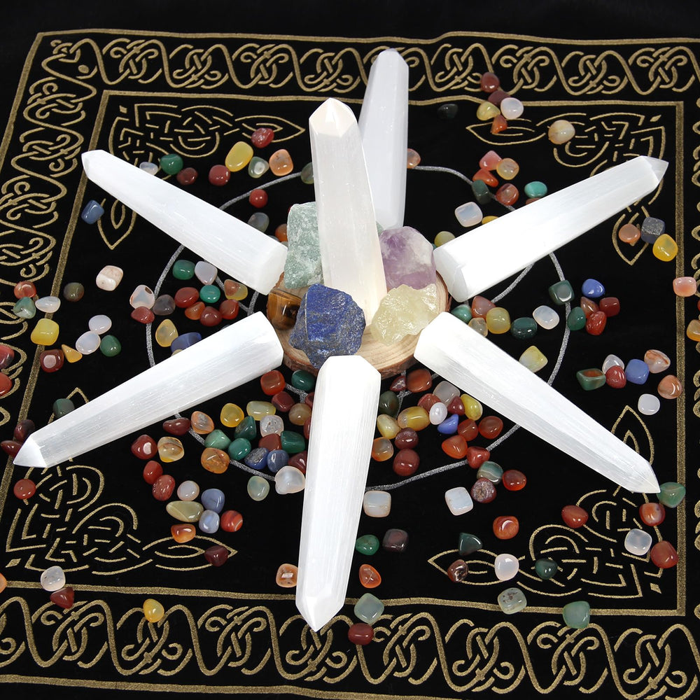 Orientrea Selenite Crystal Wand placed on a desk or shelf for calm ambiance.