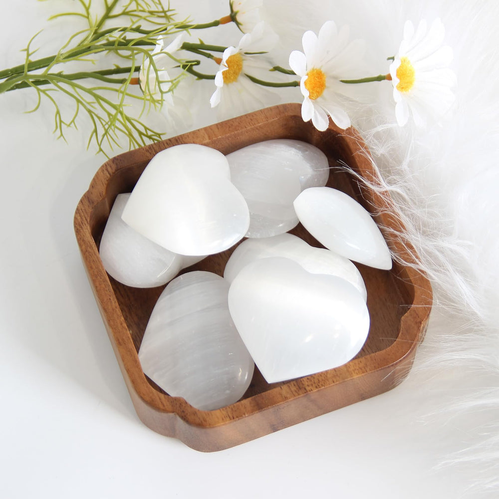 Orientrea selenite heart close-up glow illustrating natural luminescence