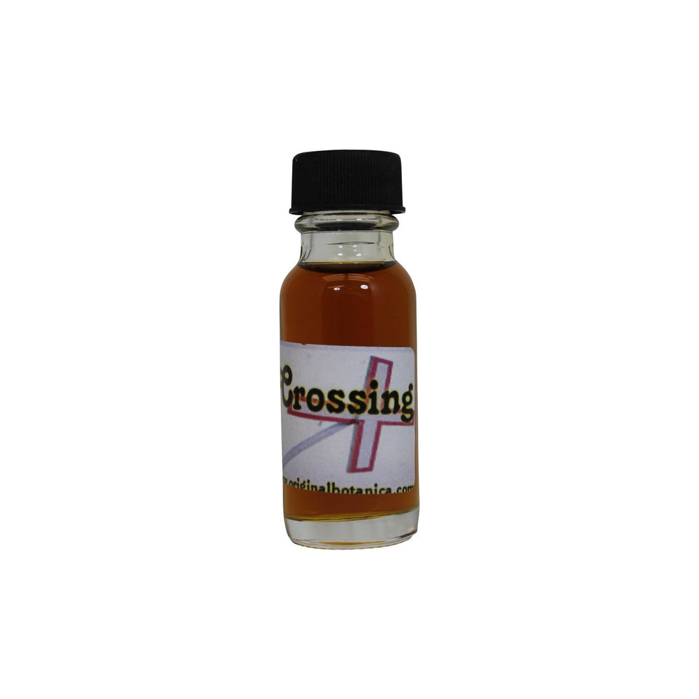 Original Botanica Crossing Oil bottle closeup supports ritual protection and focus.