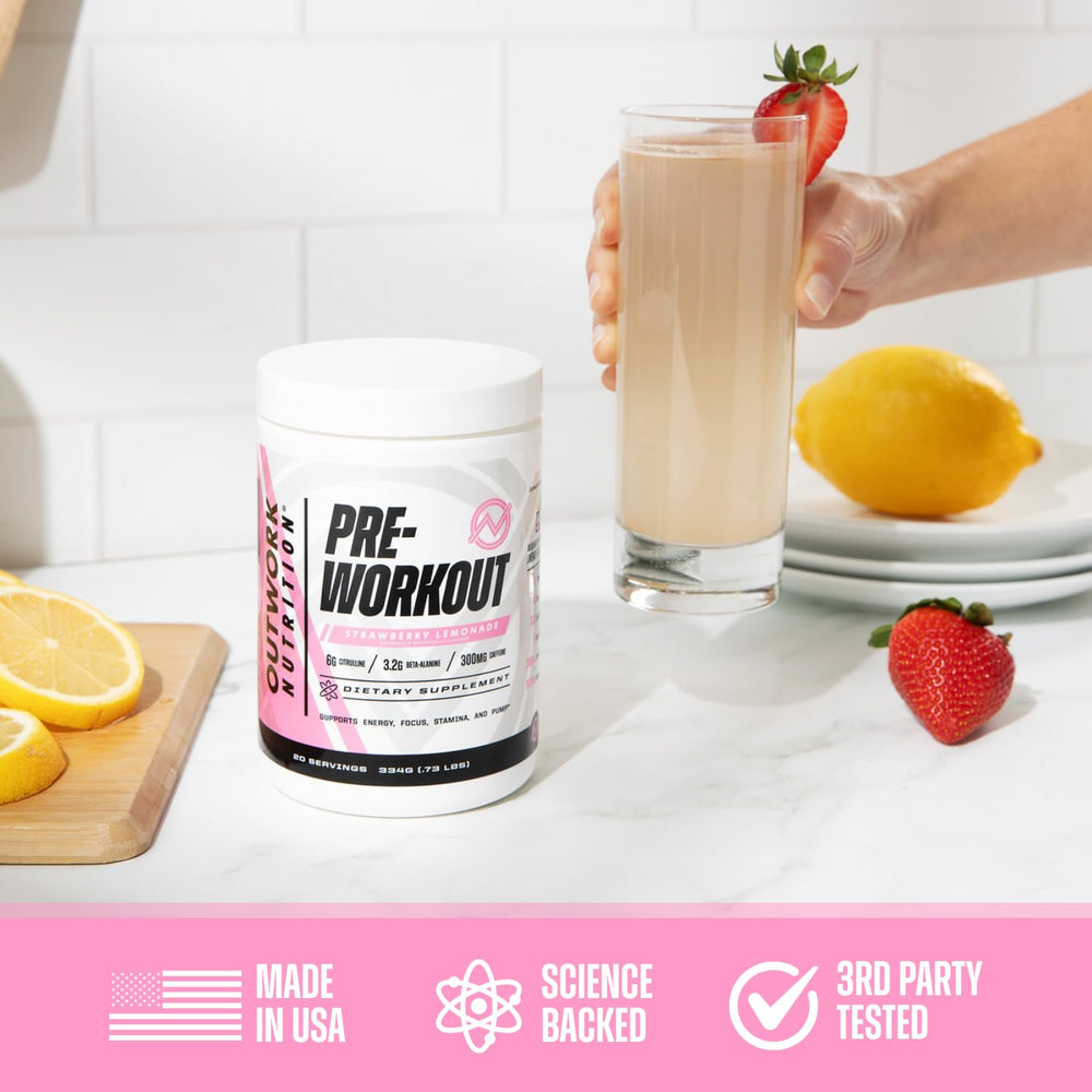 Outwork preworkout scoop pouring into a glass with ice for quick energy.