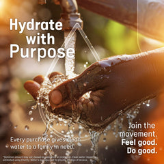 Overflo Wild Cherry packet dispensing into water for quick hydration.