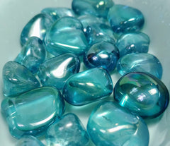 Pachamama Essentials Aqua Aura Quartz stone front view showing tranquil blue glow and energy