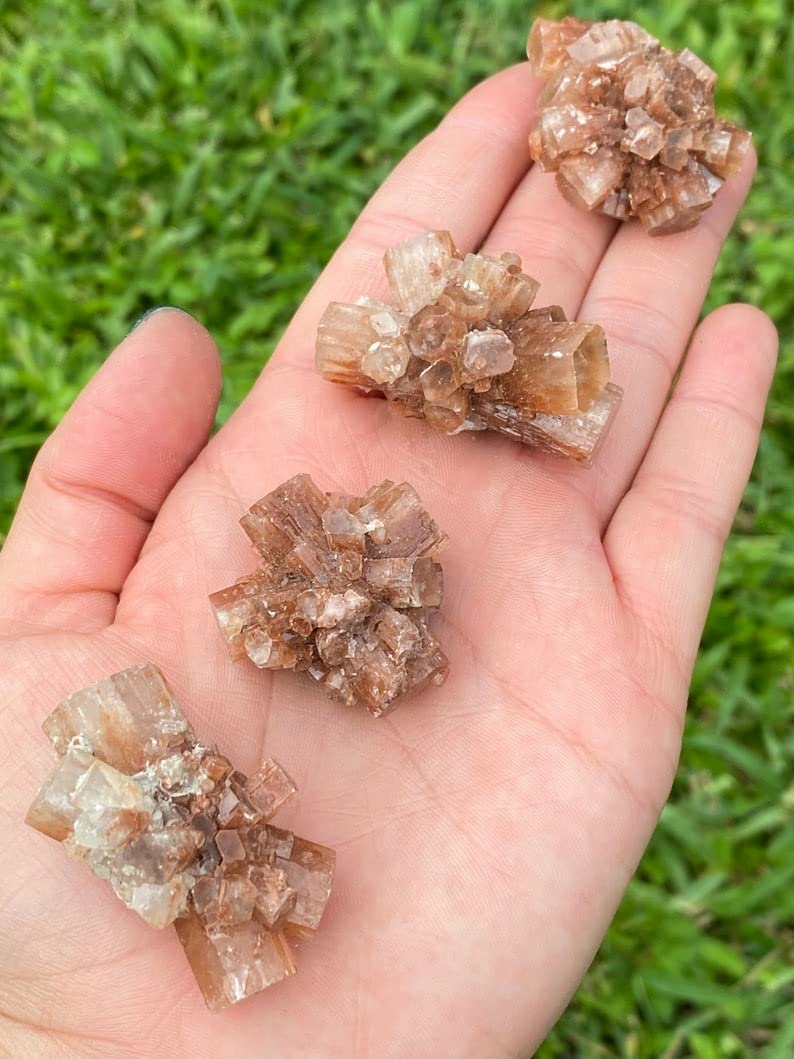 Pachamama Essentials Aragonite Cluster glow shot suggests warmth and soothing nerves.