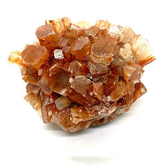 Pachamama Essentials Aragonite Cluster top-down view emphasizes stability and patience.