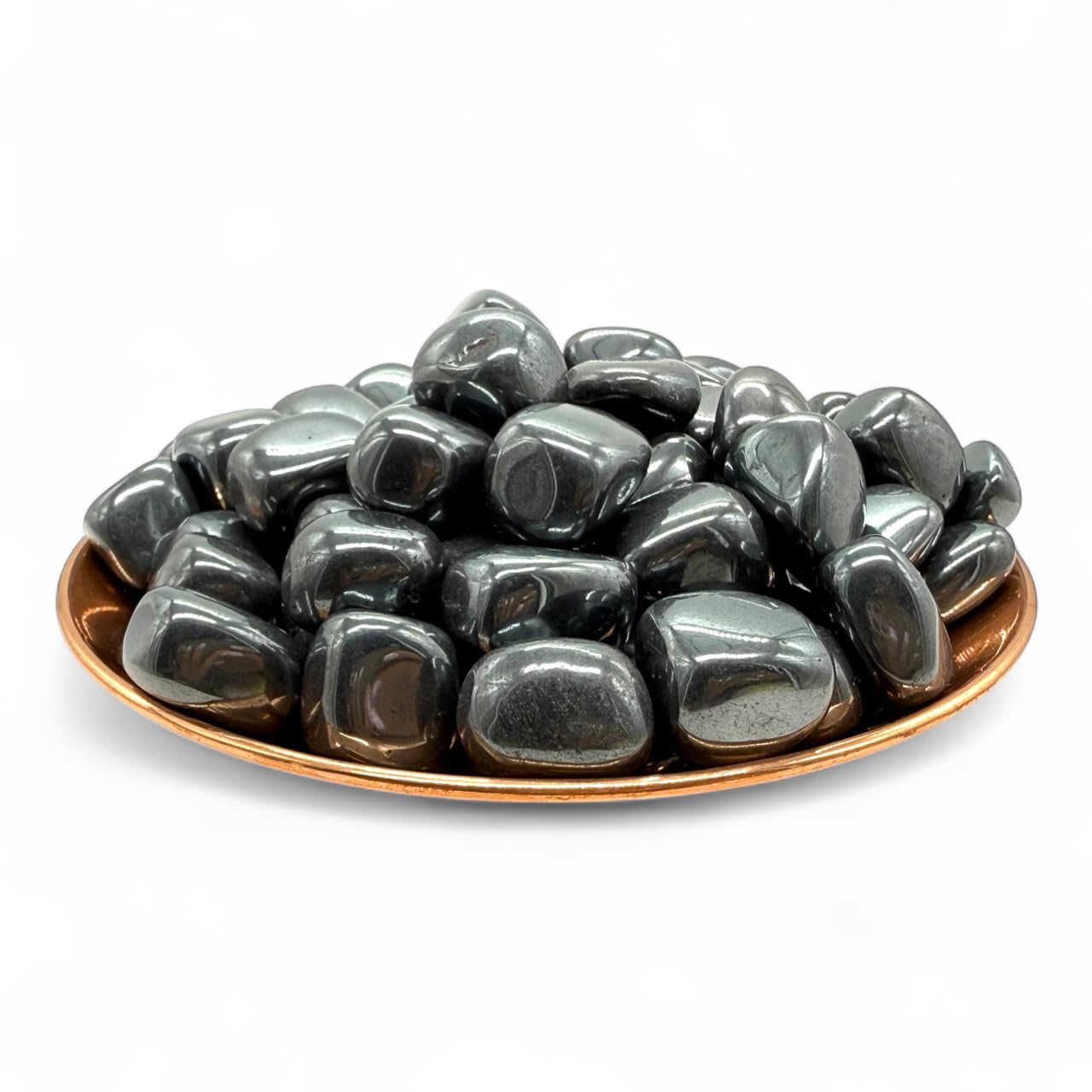 Pachamama Essentials hematite tumbled stone for grounding during meditation.