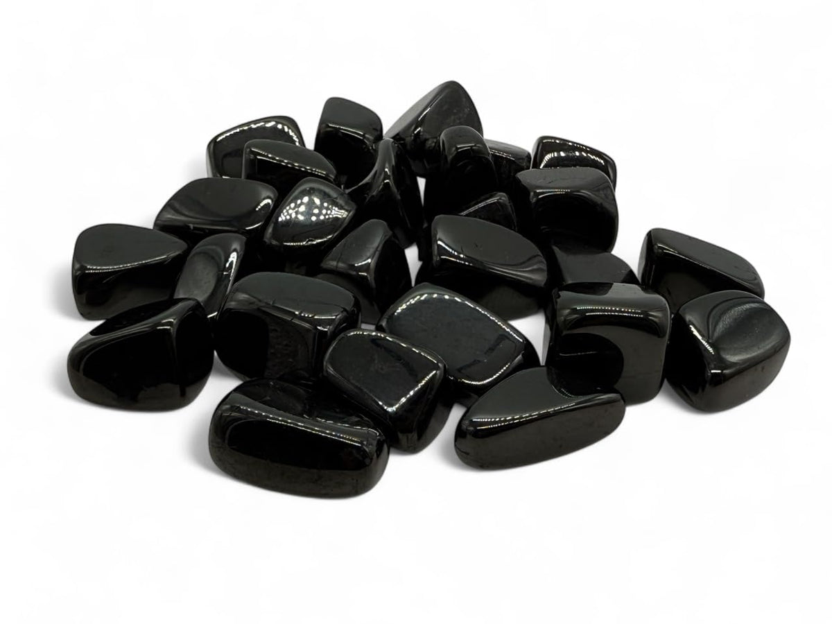 Pachamama Essentials Jet tumbled stone round 3-pack for grounding and aura cleansing.
