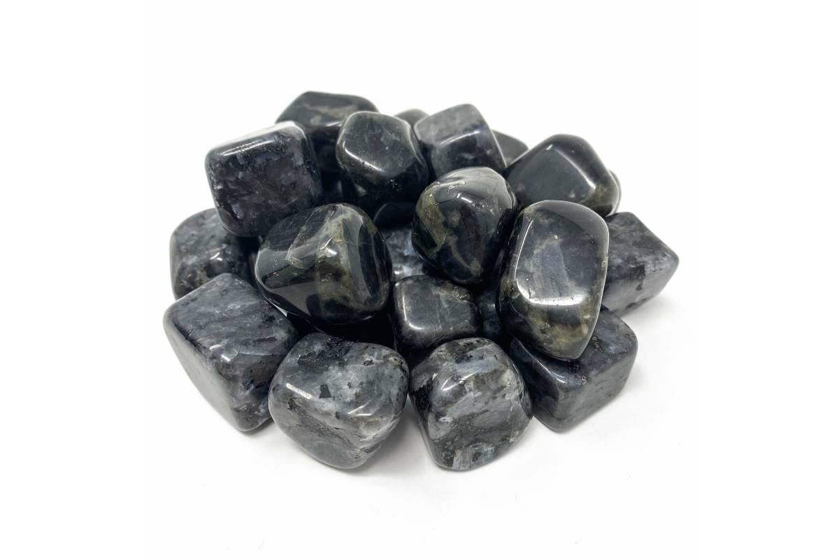 Pachamama Essentials Larvikite in meditation/altar scene emphasizing grounding energy
