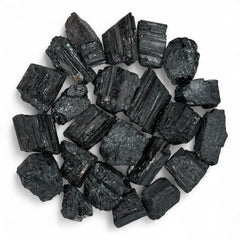 Pachamama Essentials rough black tourmaline stones for grounding and focused work.