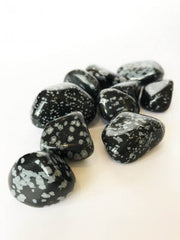 Pachamama Essentials Snowflake Obsidian close-up showing snowflake patterns and calming potential.