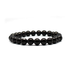Pachamama Essentials stretchy shungite bracelet worn on wrist for daily protection from tech energies