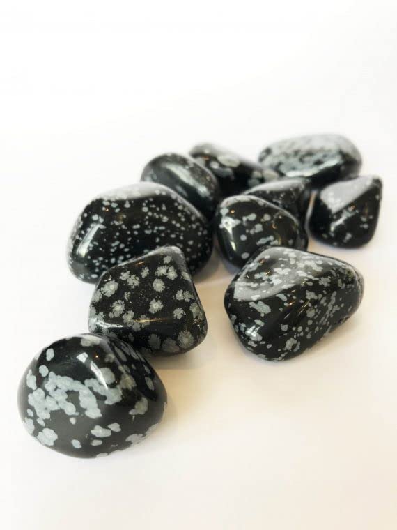 Pachamama Essentials Snowflake Obsidian closeup, 5 stones, promotes calm and positive space.