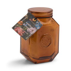 Paddywax Botanica candle in an embossed glass jar adds warm ambiance to any room.