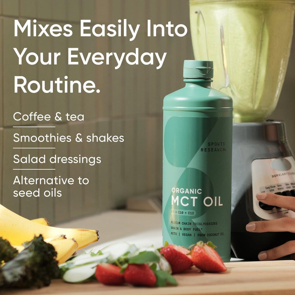 Palm-free MCT oil bottle packaging beside a glass of water