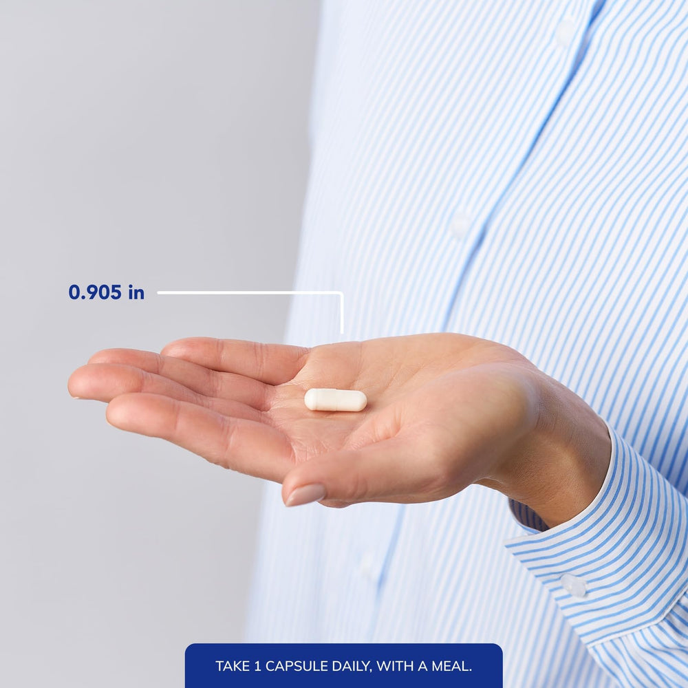 Pouring Pantothenic Acid capsules into the hand suggests easy daily dosing.
