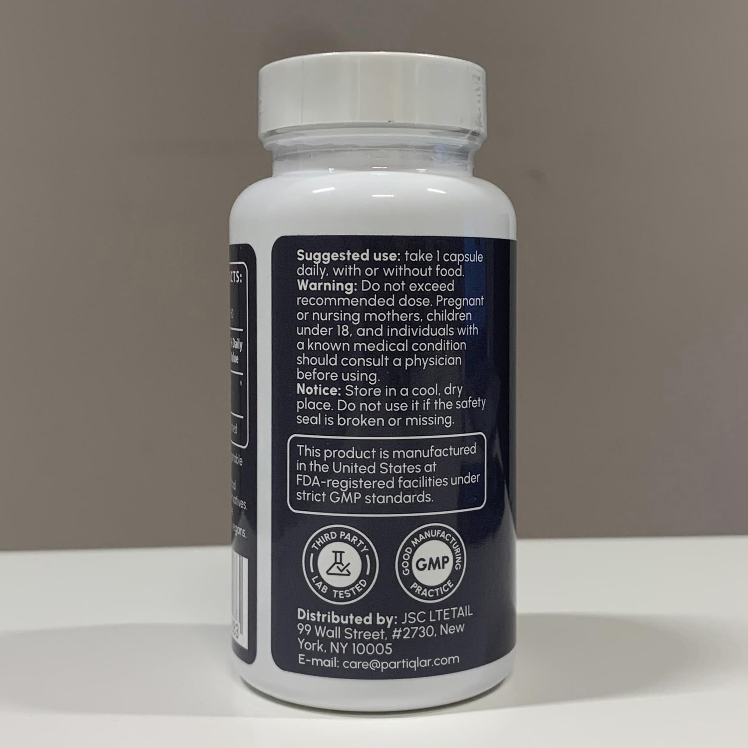partiQlar nr capsule close-up reveals smooth texture for daily use.