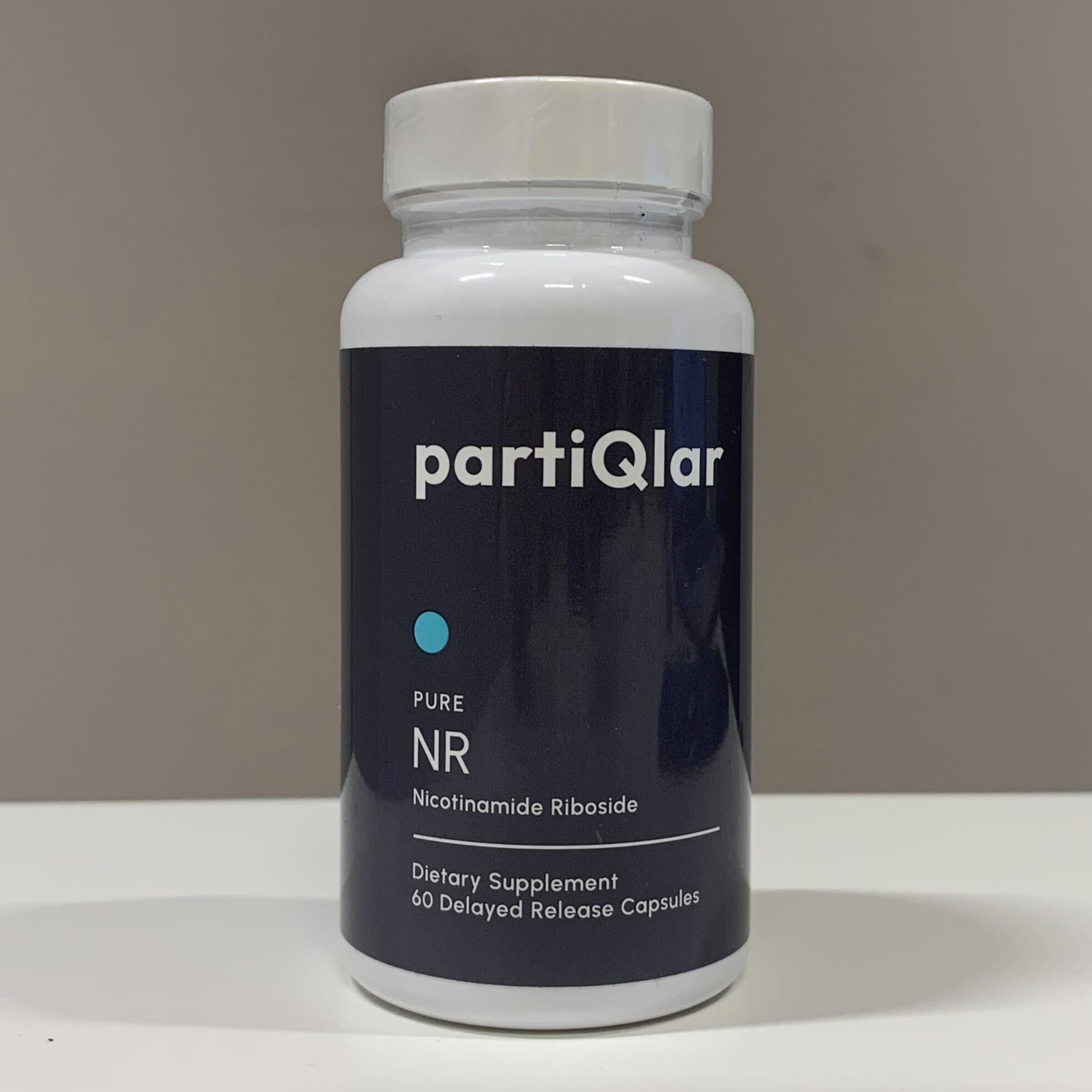 partiQlar nr packaging in hands highlights two-month supply convenience.