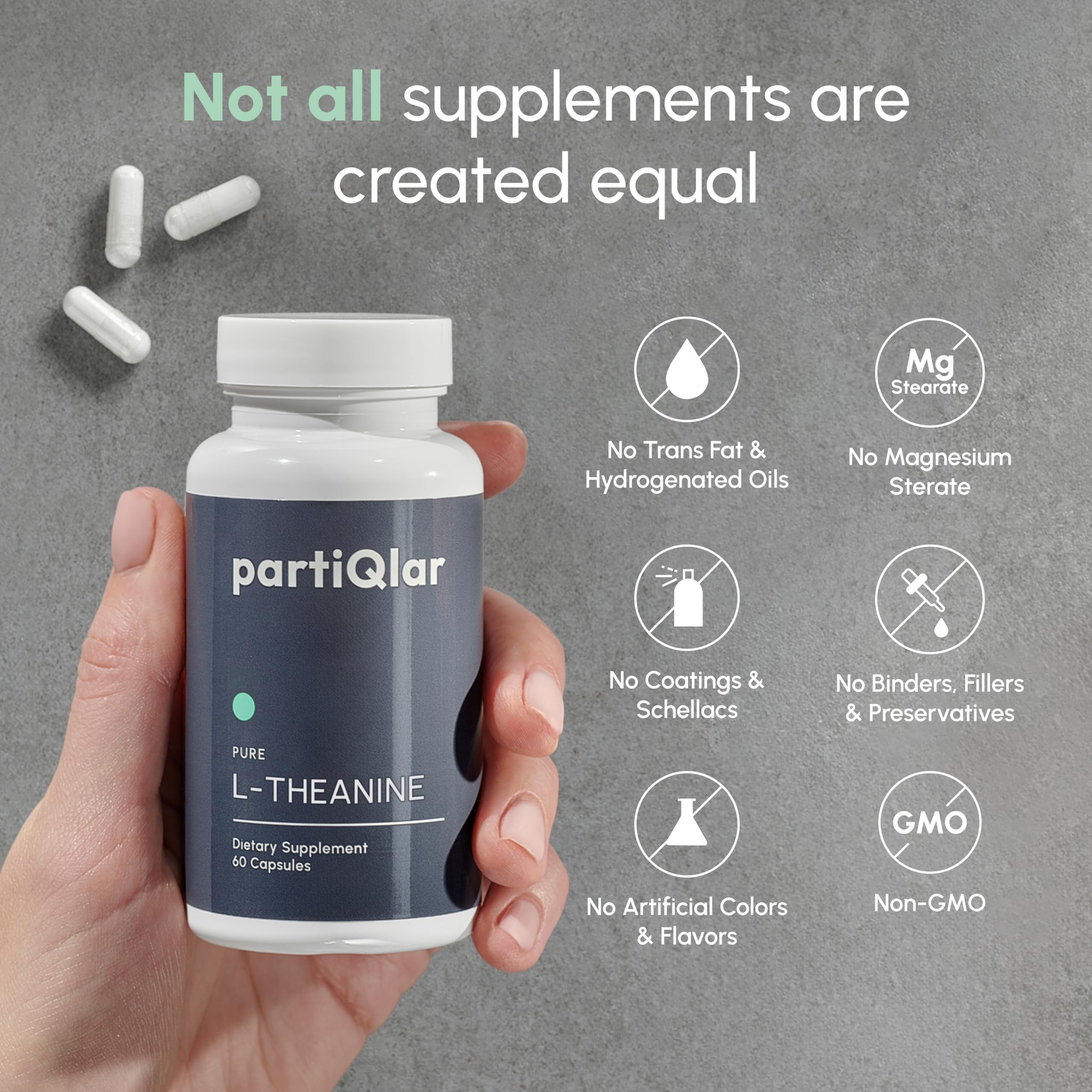 partiQlar Pure L-Theanine capsules on table with glass of water for daily use.