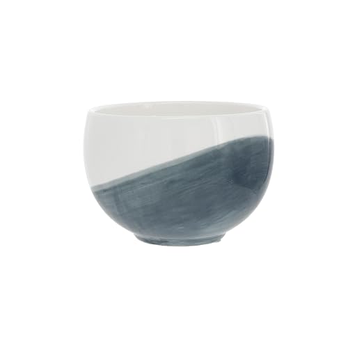 Organic-shaped Pavilion ceramic vessel complements modern neutral decor.