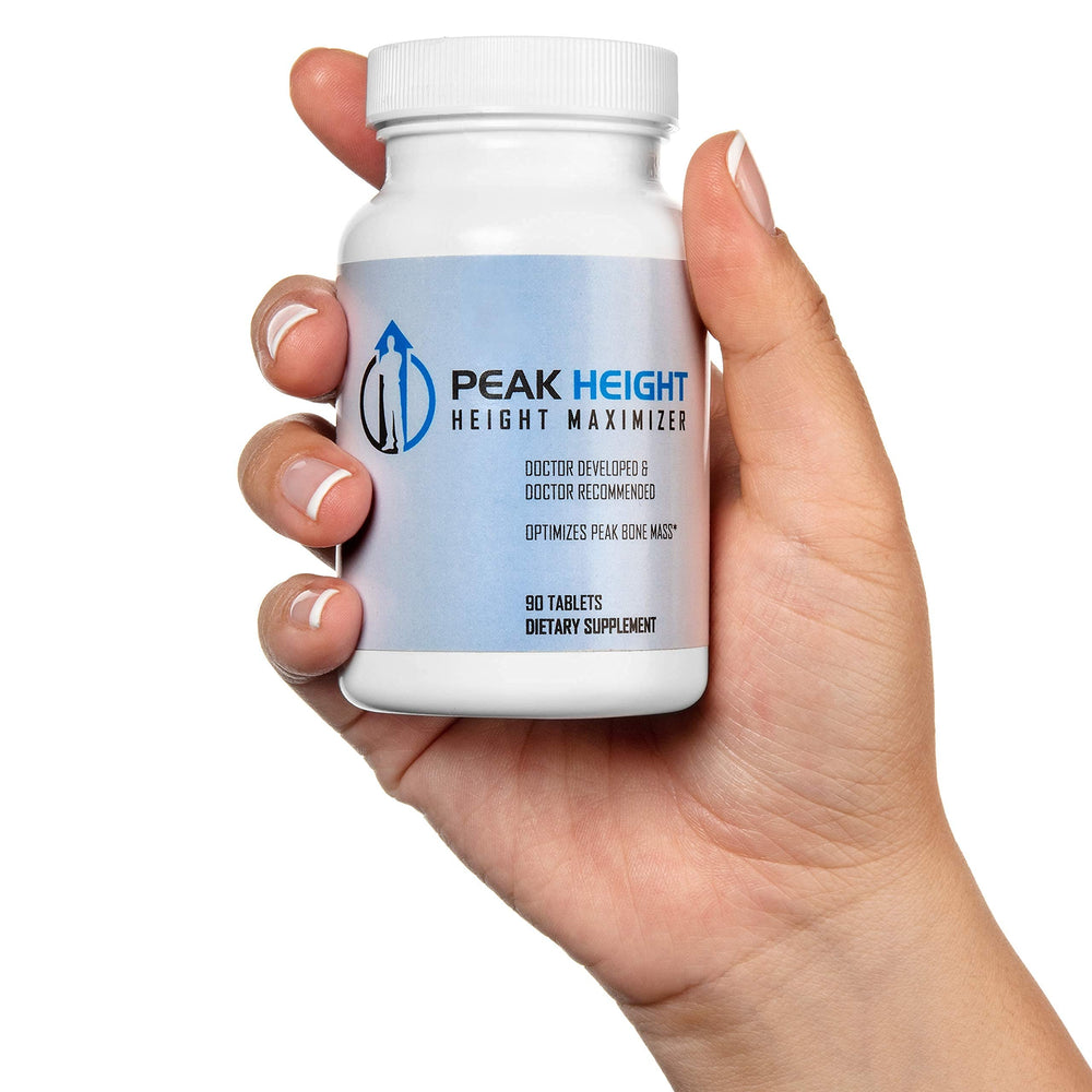 Young adult taking Peak Height capsule as routine.