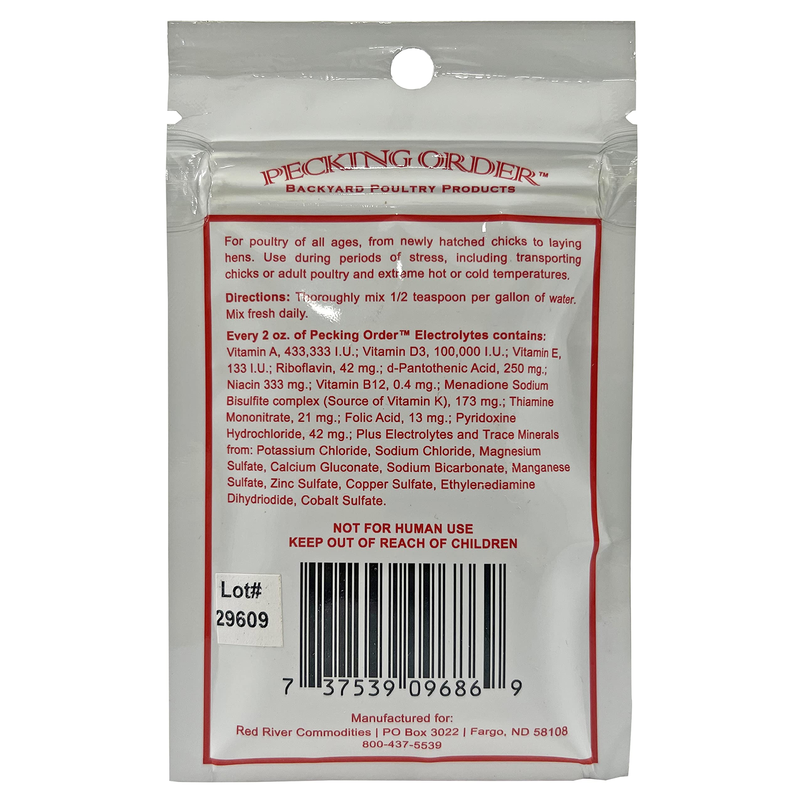 Pecking Order label closeup yellow highlights vitamin boosts for growing and laying poultry.