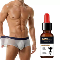 Penis Enlargement Max Out Ayiti oil bottle being poured for massage