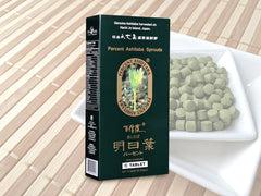 Percent Ashitaba Tablet closeup shows tablet texture and natural nutrients