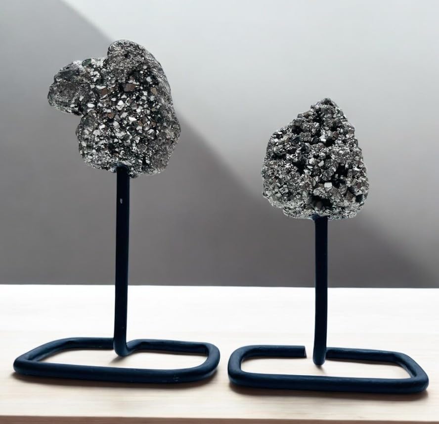 Peru pyrite geode cluster shines under light for captivating shelf decor.