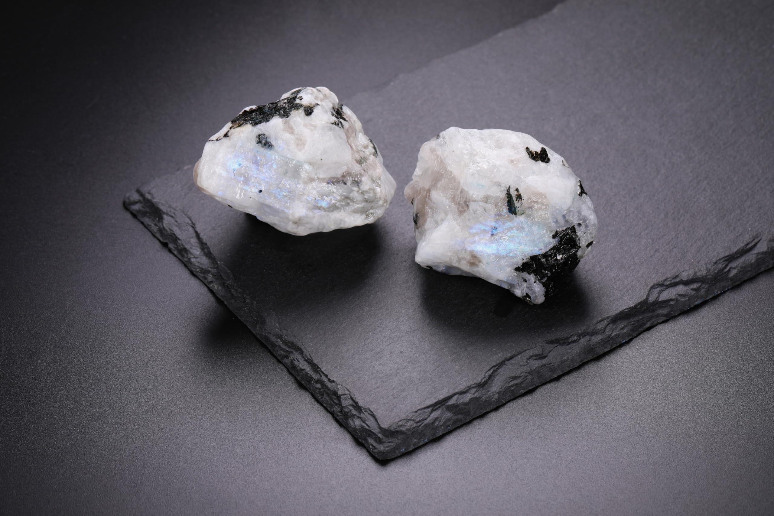 PESOENTH Black Moonstone pair showing natural purple hues for collectors.