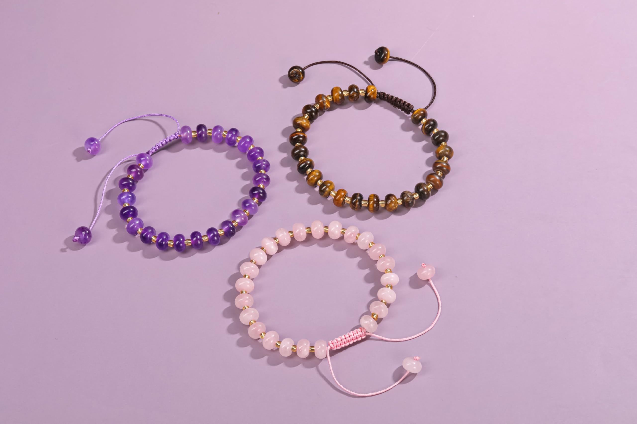 PESOENTH Gold-Brown Beaded Bracelet adds versatile style to casual and formal looks.