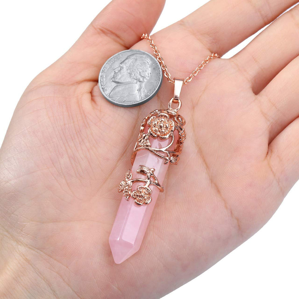 PESOENTH hexagonal rose quartz point pendant highlighting craftsmanship.