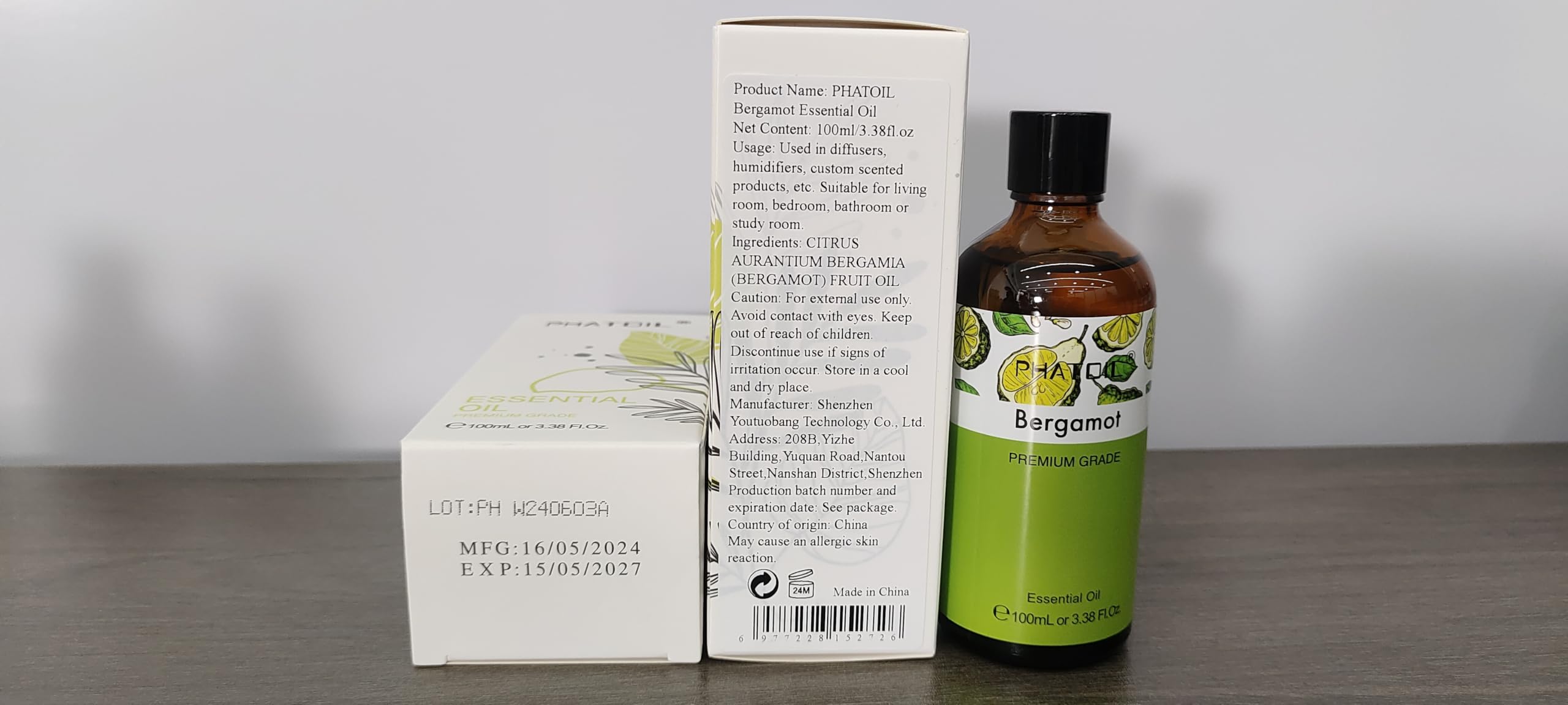 PHATOIL Bergamot essential oil bottle shown for DIY diffuser and candle making.