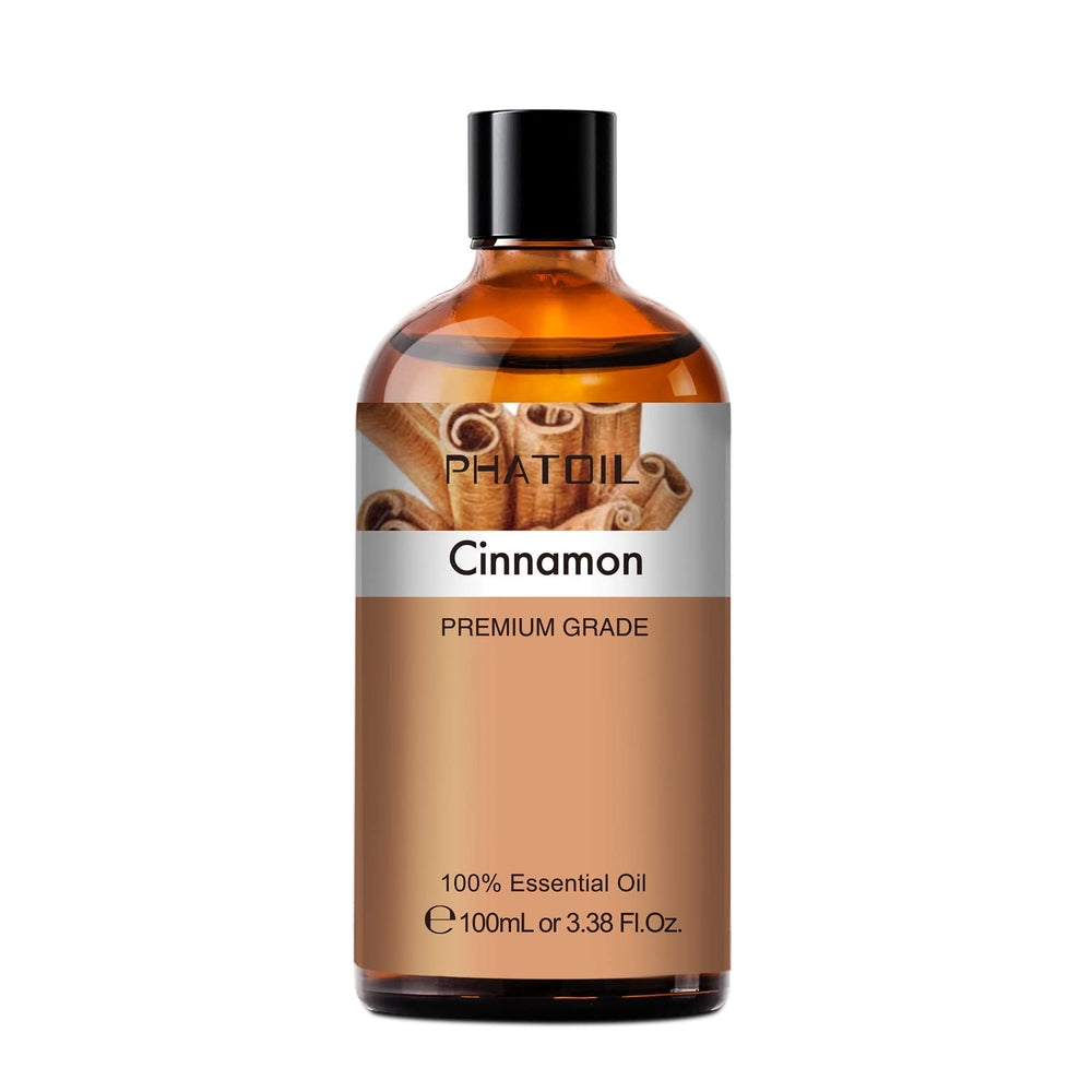 PHATOIL Cinnamon oil in a diffuser-ready bottle for cozy room fragrance.
