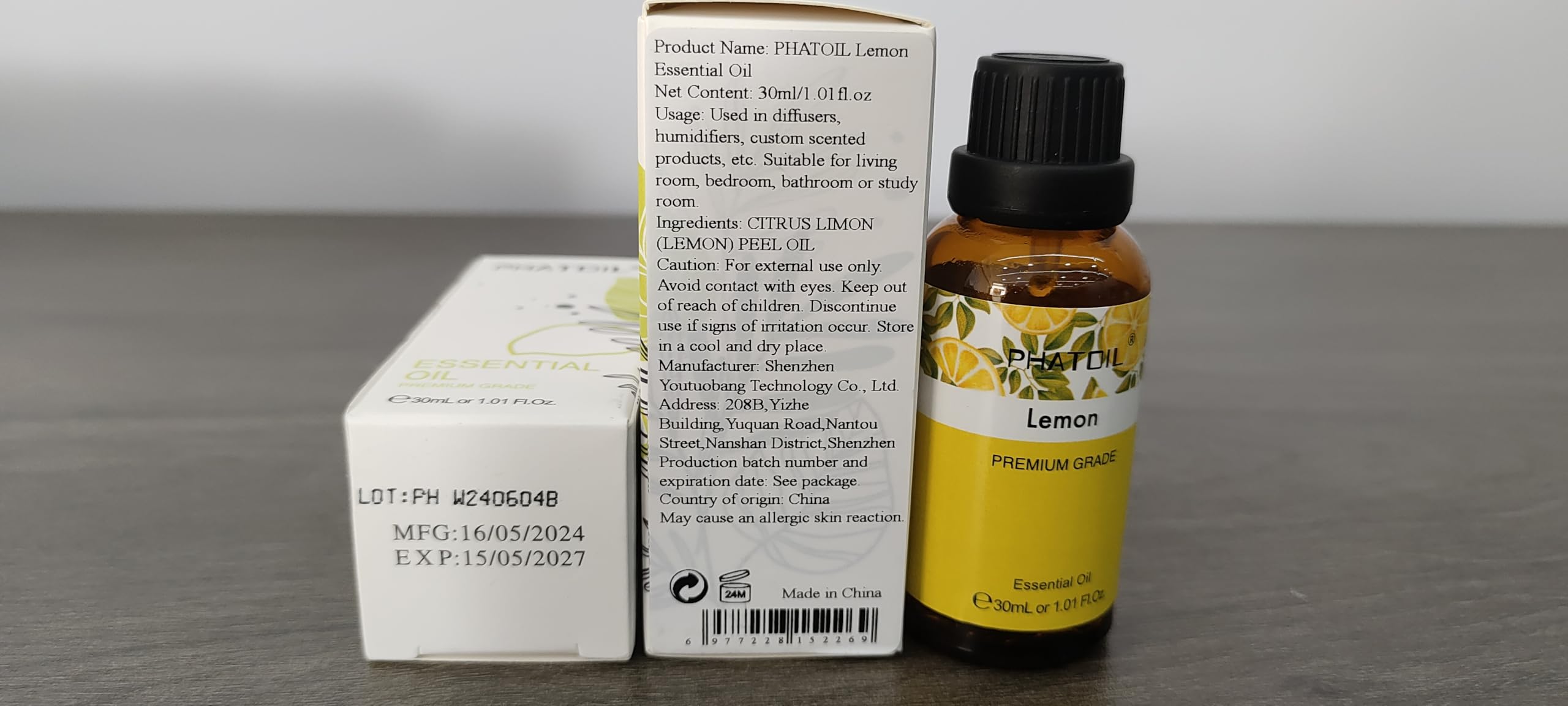 PHATOIL Lemon essential oil bottle showcasing long-lasting fragrance.