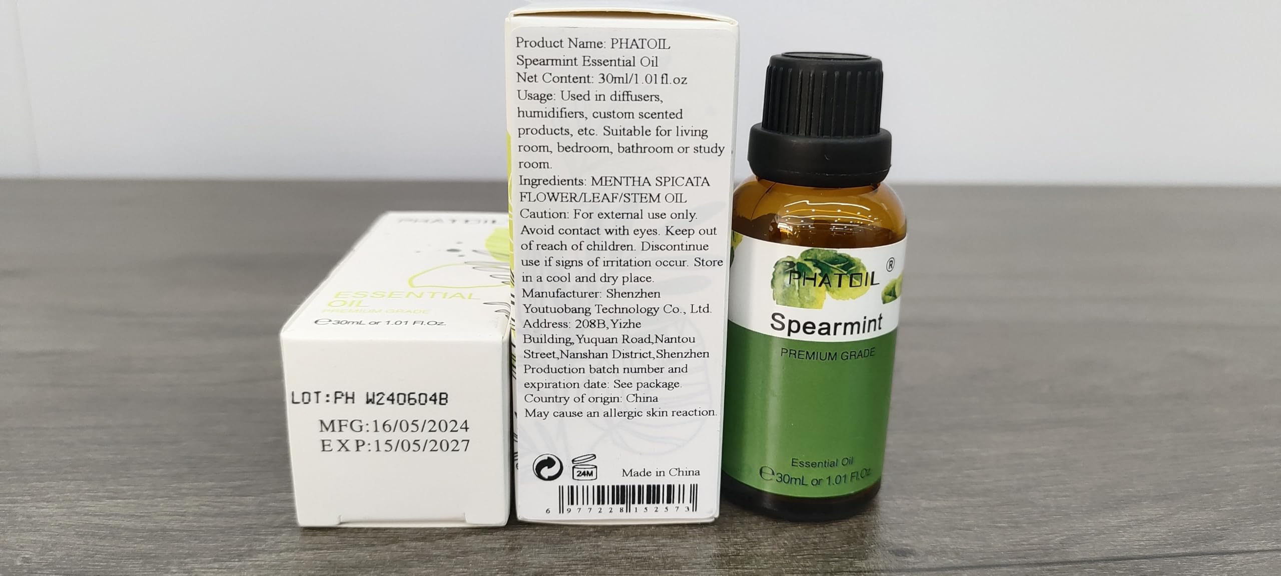 PHATOIL Spearmint essential oil packaging with built-in dropper for precise measuring.