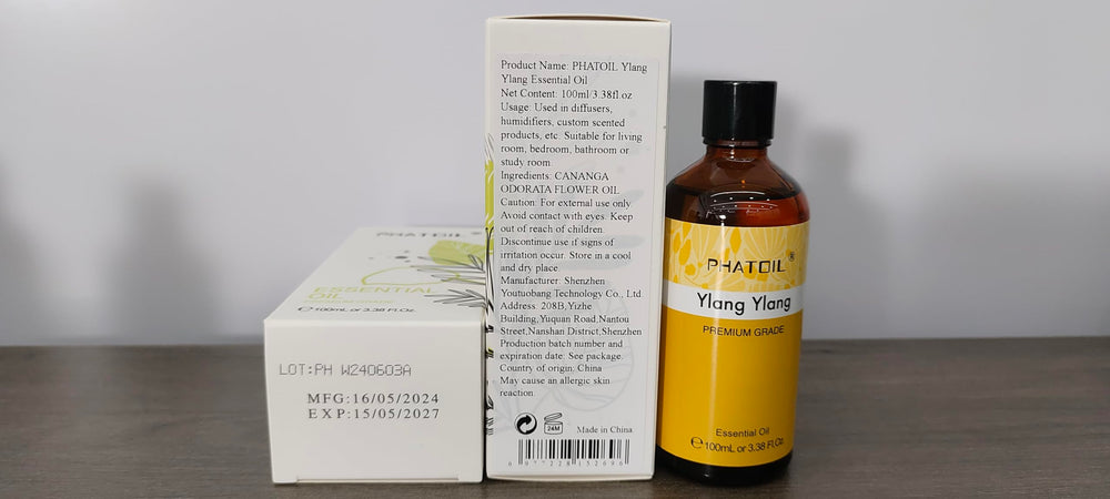 PHATOIL Ylang Ylang essential oil close-up showcasing rich aroma