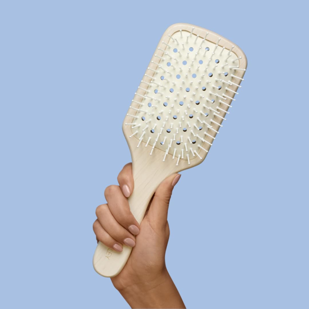 Philip Kingsley vented paddle brush anti-static helps reduce flyaways for polished results