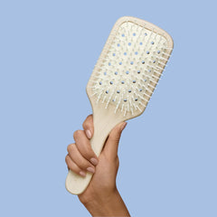 Philip Kingsley vented paddle brush anti-static helps reduce flyaways for polished results