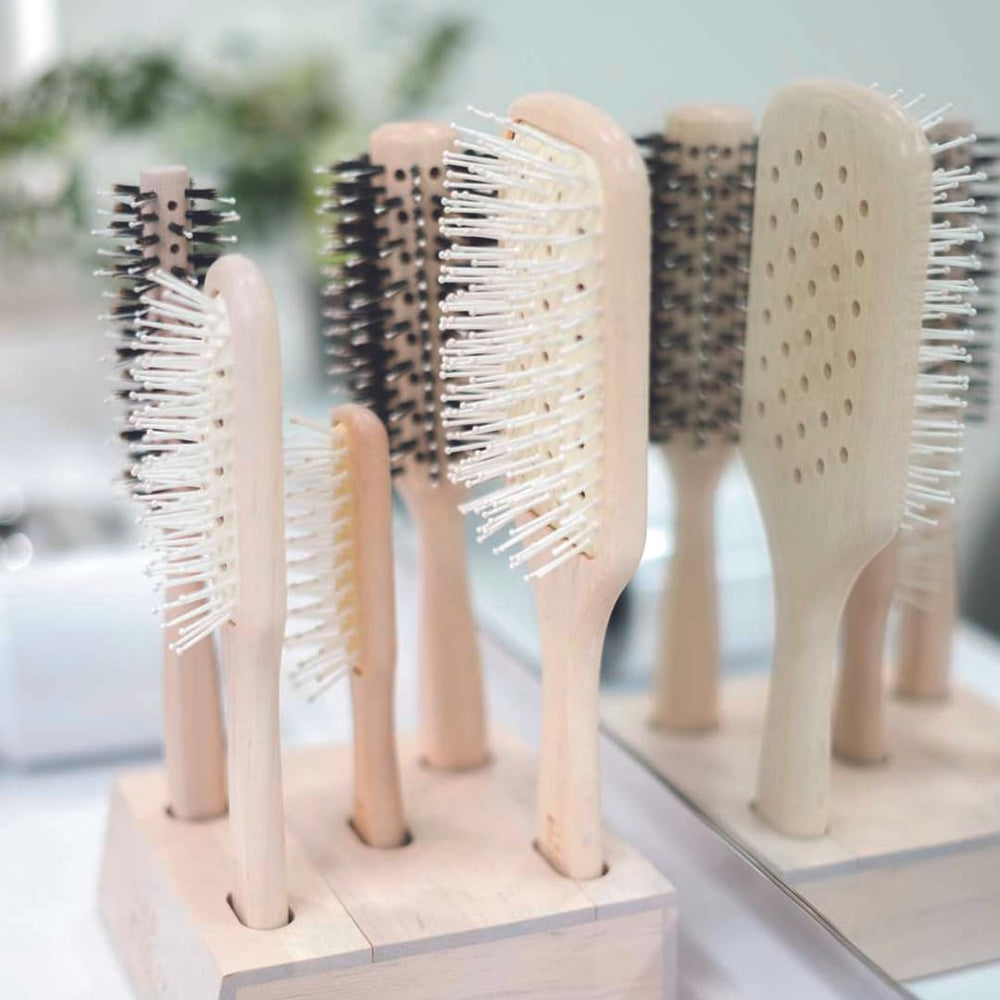 Philip Kingsley vented paddle brush easy-clean design keeps hair and buildup away