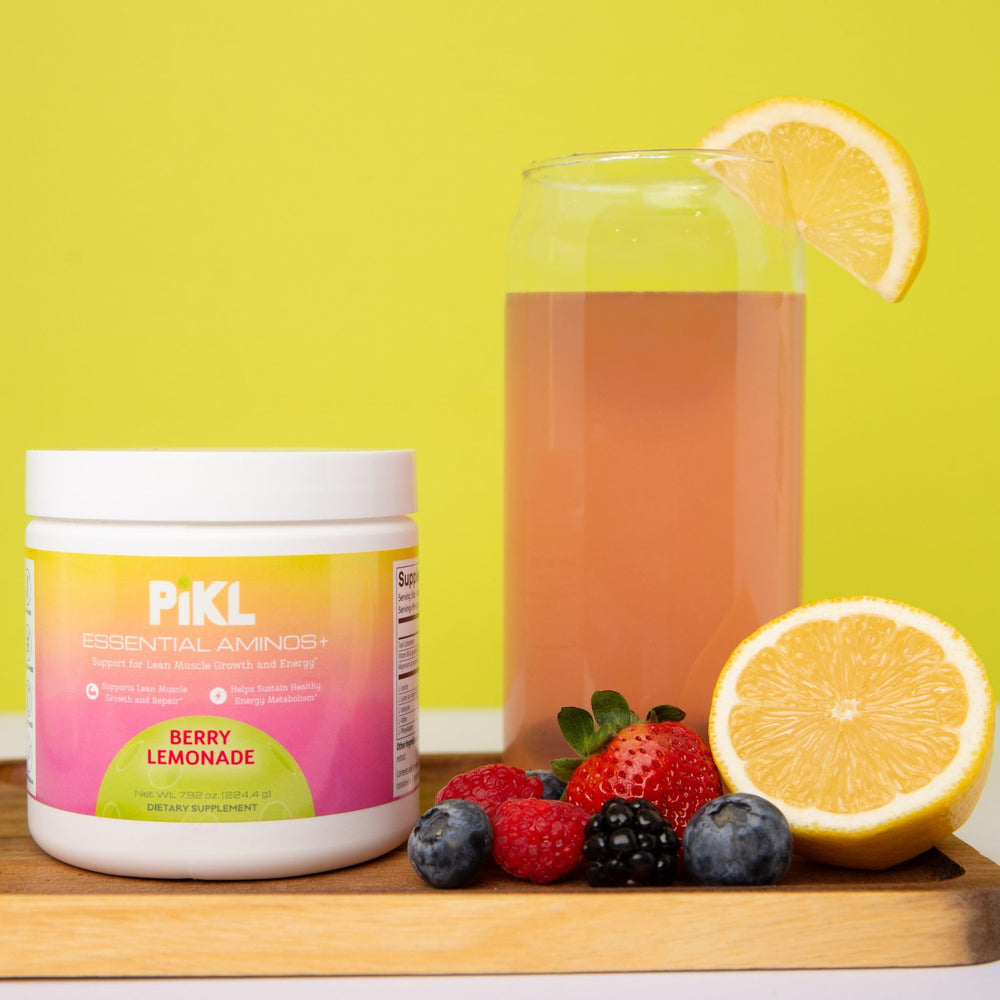 PiKL Essential Aminos+ serving scoop beside Berry Lemonade jar