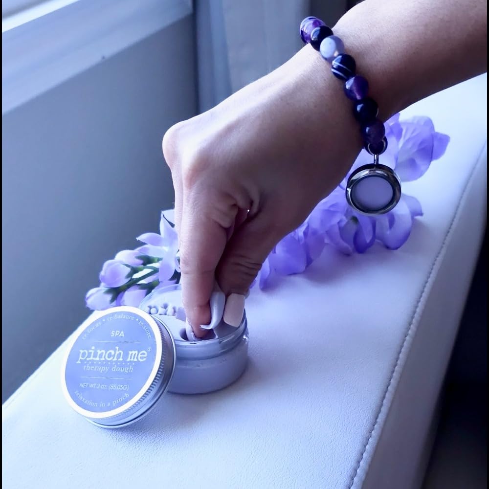 Pinch Me tiger's eye bracelet highlighting the gemstone and hidden charm.