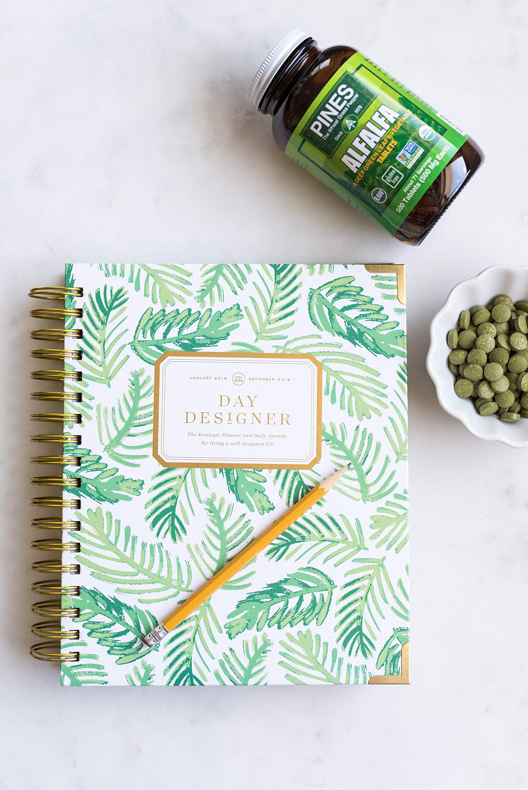 PINES Organic Barley Grass in a glass of juice, plant-based boost